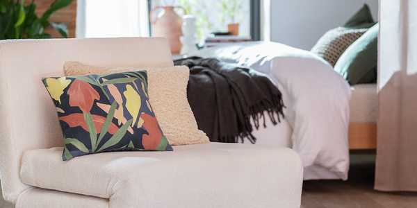 A Habitat embroidered floral cushion in multicolour. 